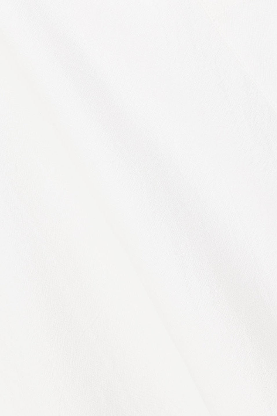White mini dress with a strapless neckline, back view