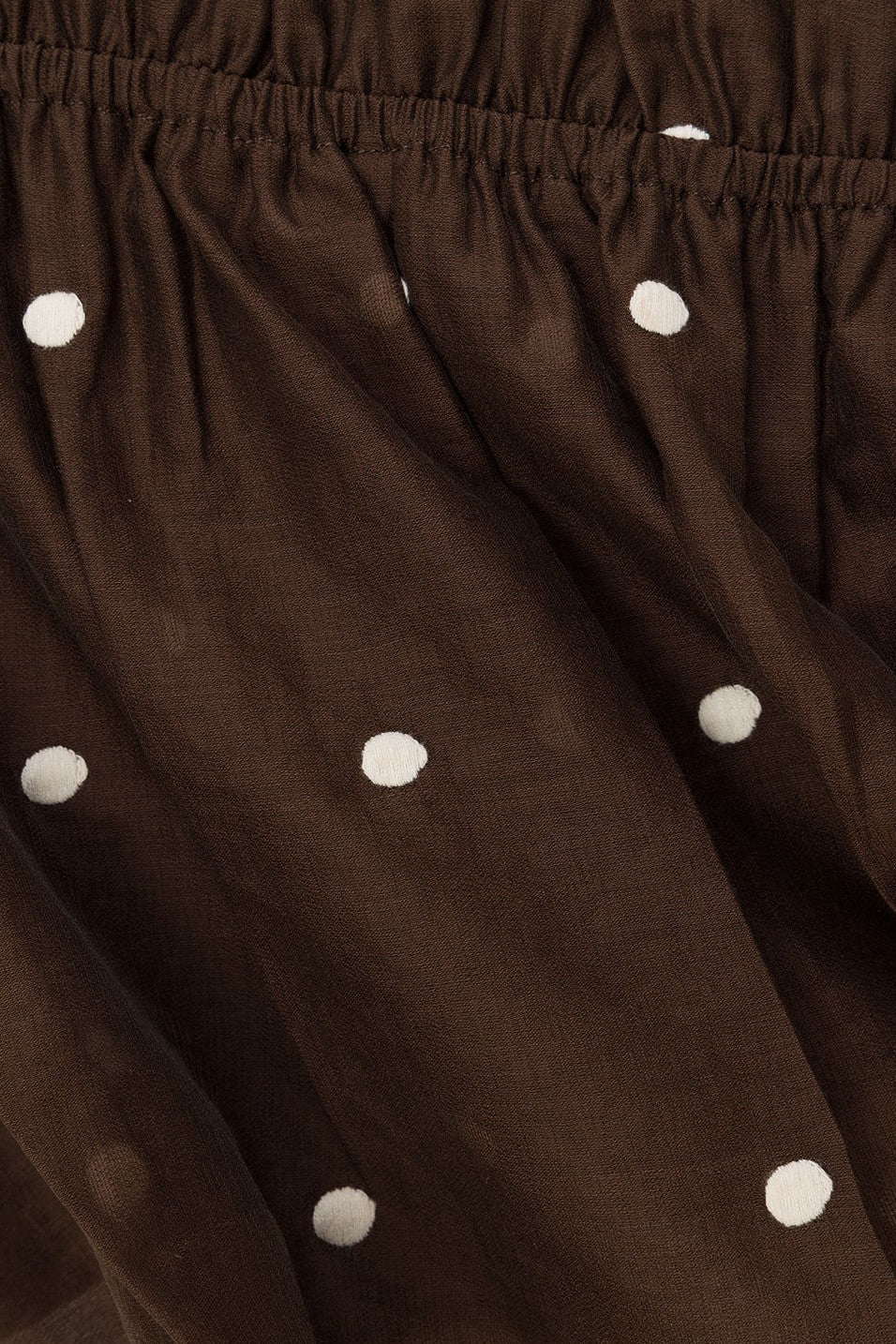 Brown mini dress with a V neckline, side view
