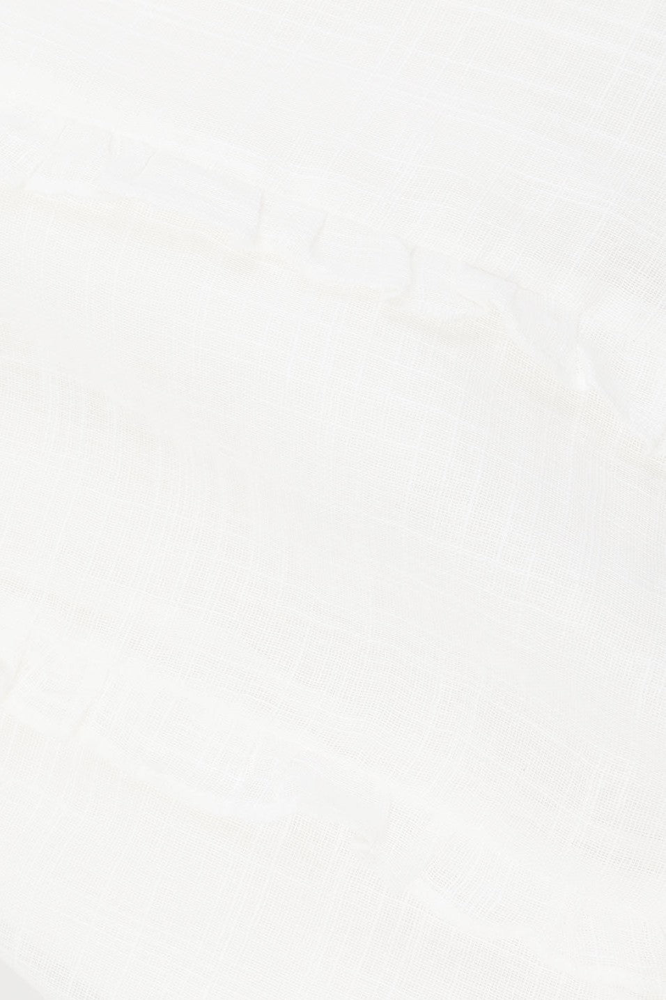 White mini dress with a halter neckline, back view