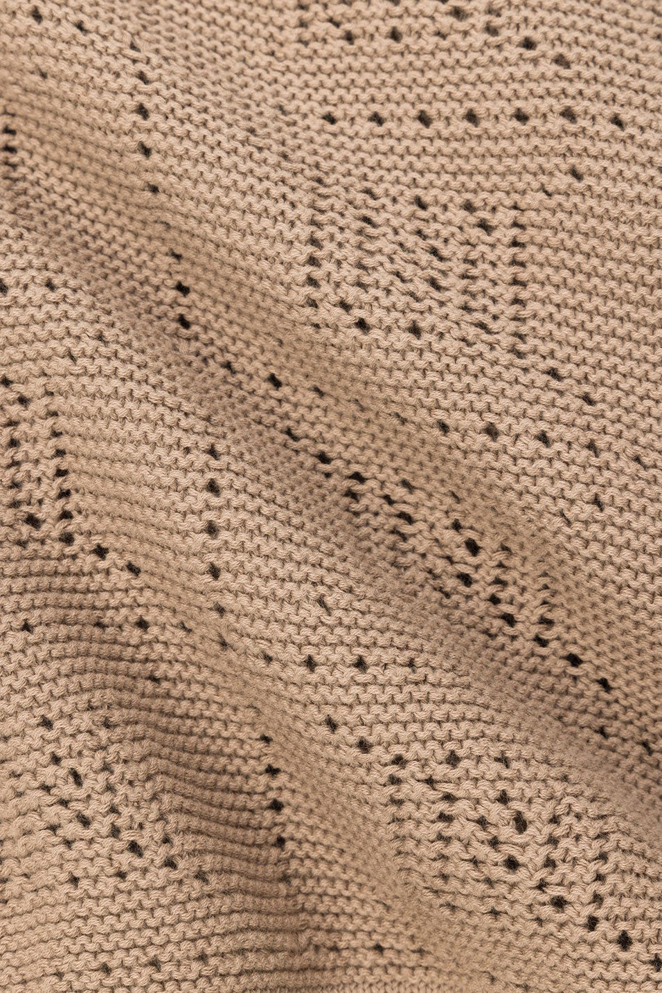 Brown mini dress with a wrap silhouette, side view