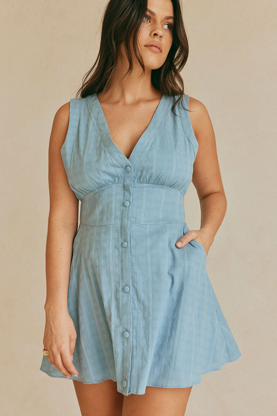 Blue mini dress with a plunging V neckline, front view