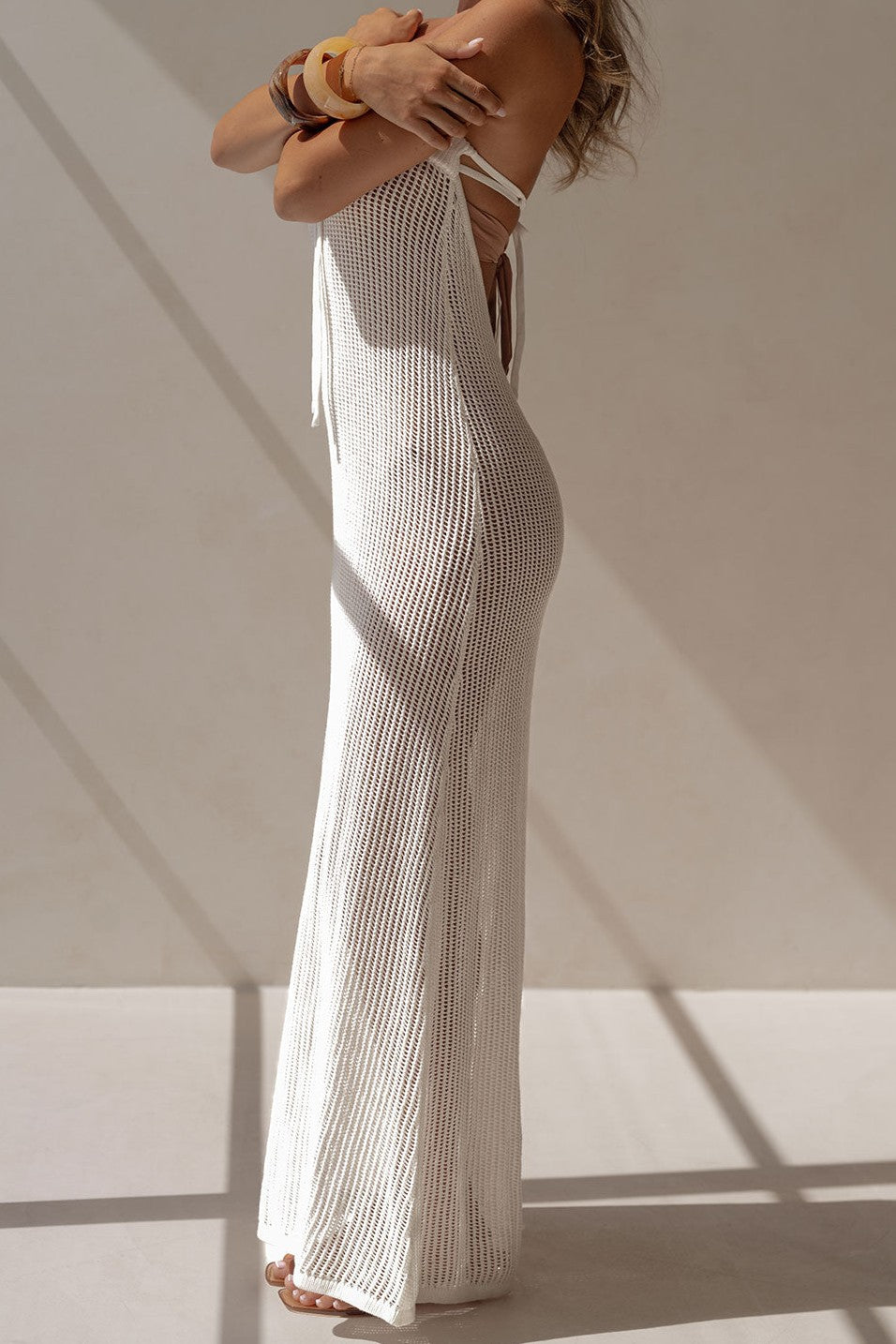 White maxi dress with a strapless neckline, detail view