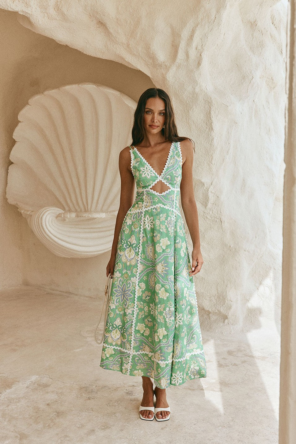 Green maxi dress with an open back, back view