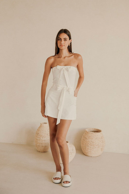 White mini dress with a strapless neckline, front view