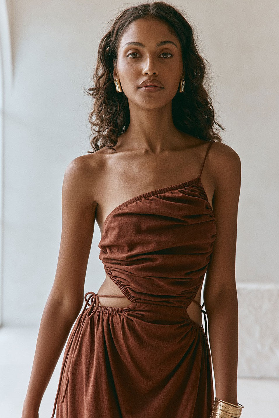 Brown maxi dress with an open back, detail view