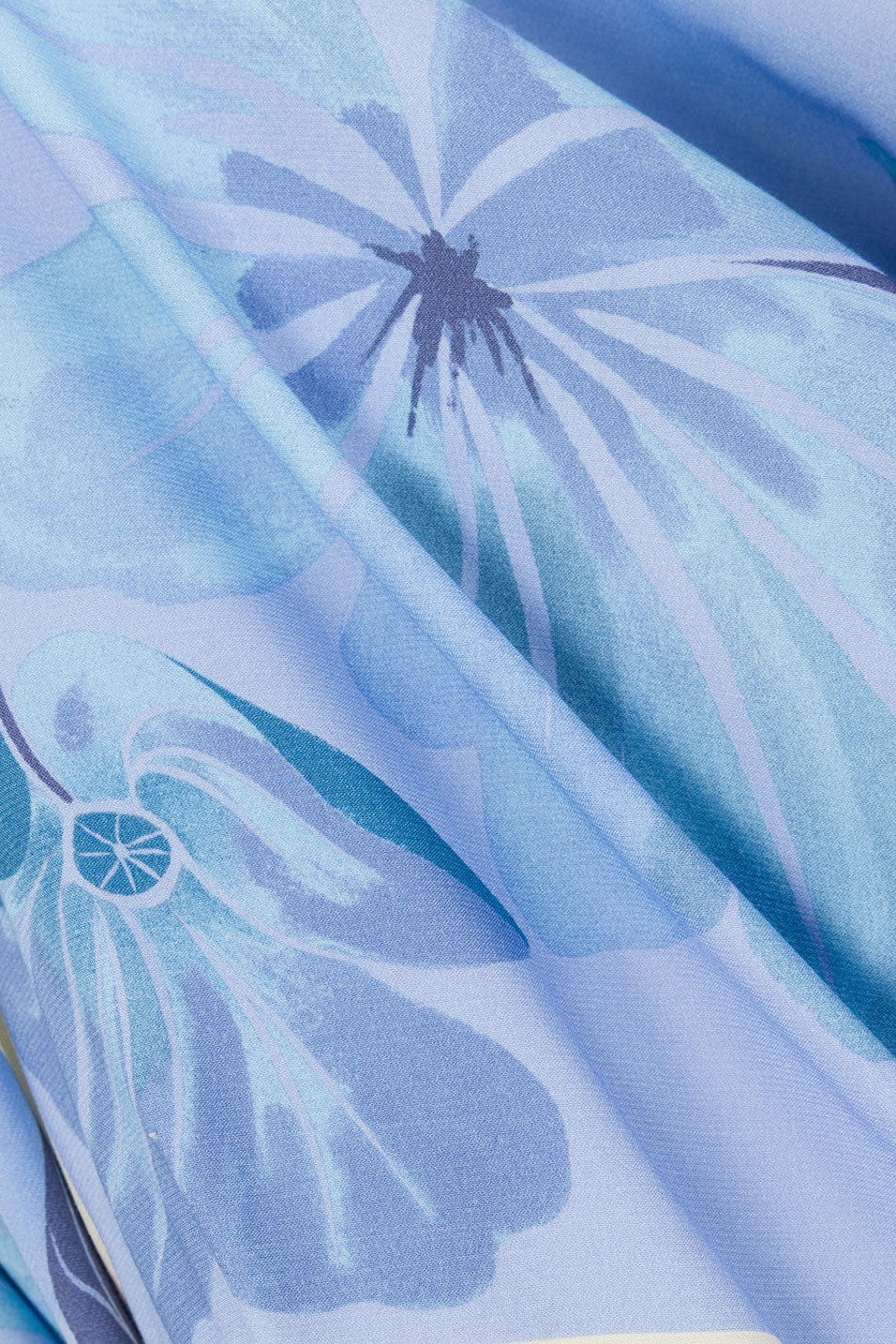 Blue maxi dress with a strapless neckline, side view