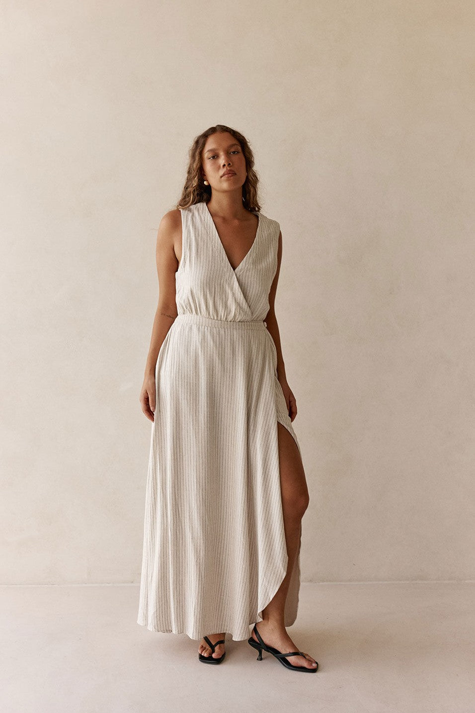 Beige maxi dress with a wrap silhouette, detail view