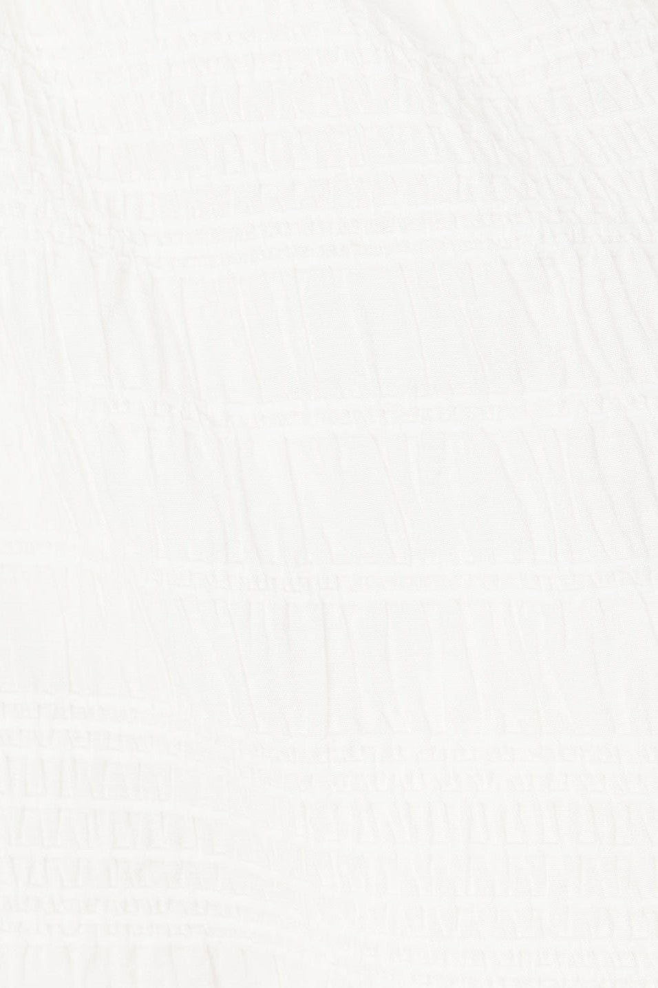 White mini dress with a V neckline, back view
