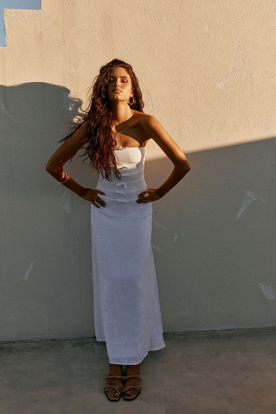 White maxi dress with a strapless neckline, front view