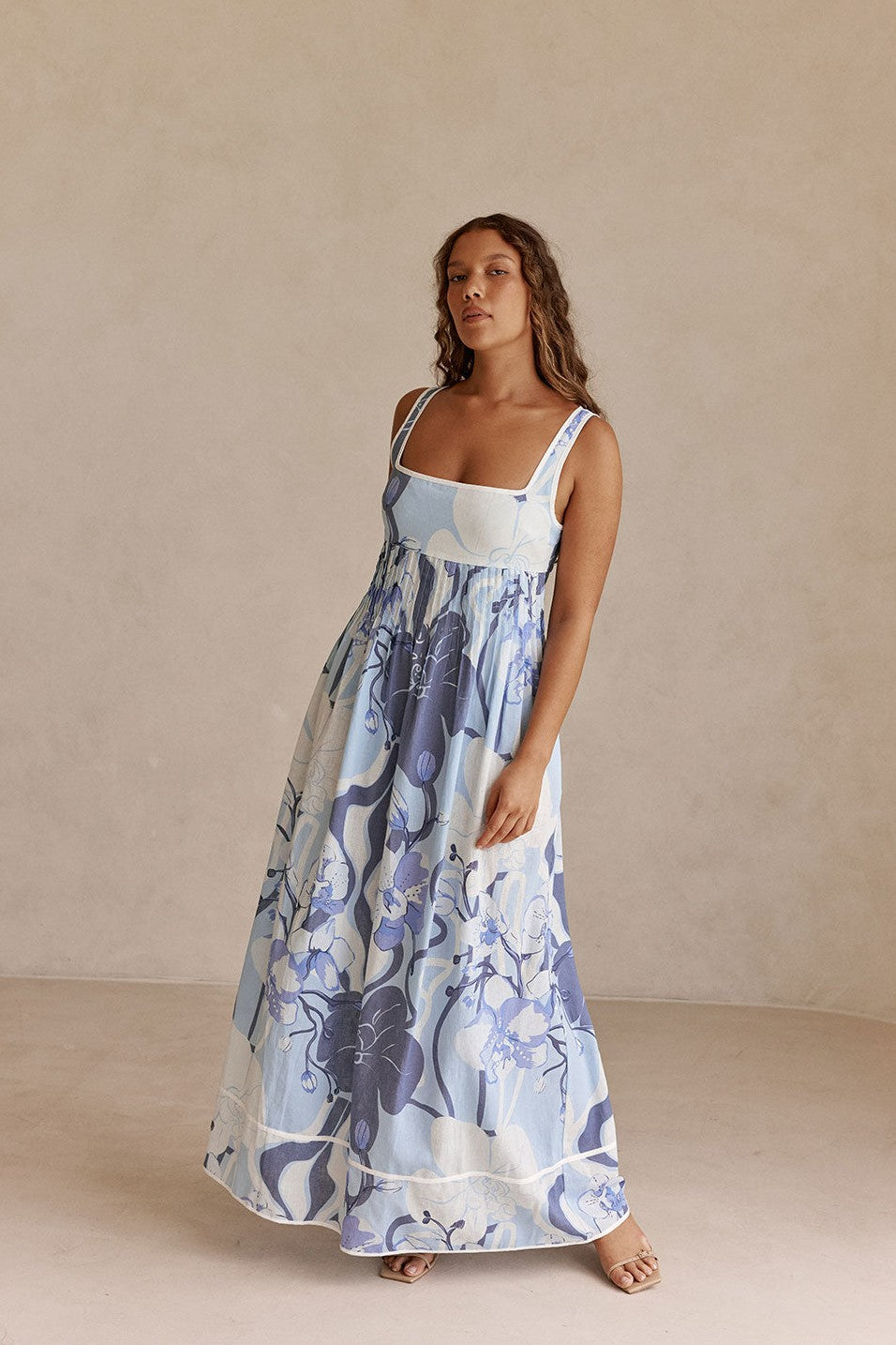 Blue maxi dress with an A-line skirt, back view
