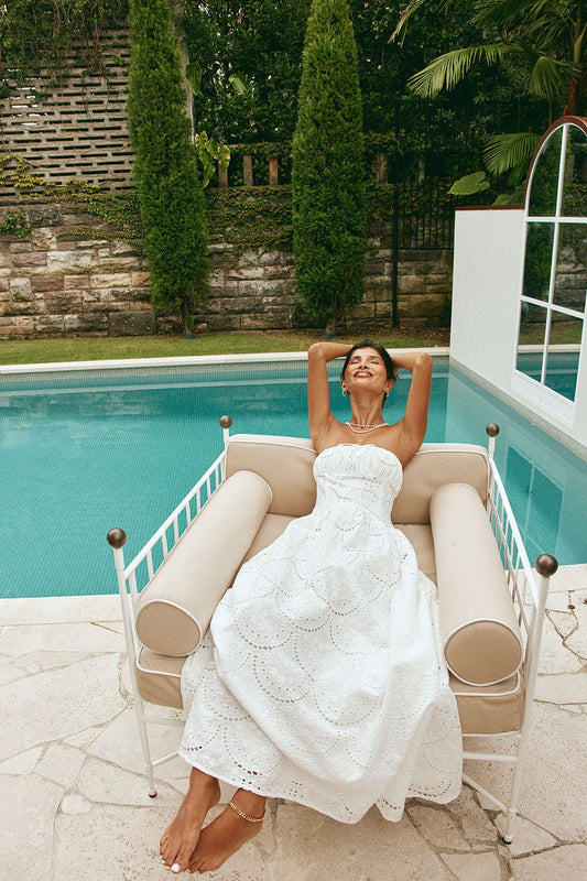 White maxi dress with a strapless neckline, front view