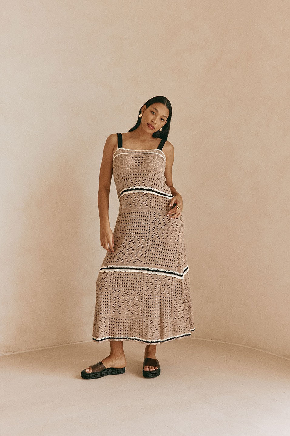 Brown maxi dress with an A-line skirt, back view