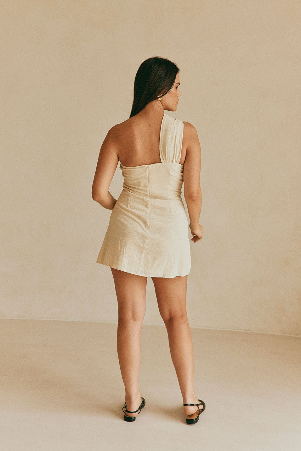 Beige mini dress, side view