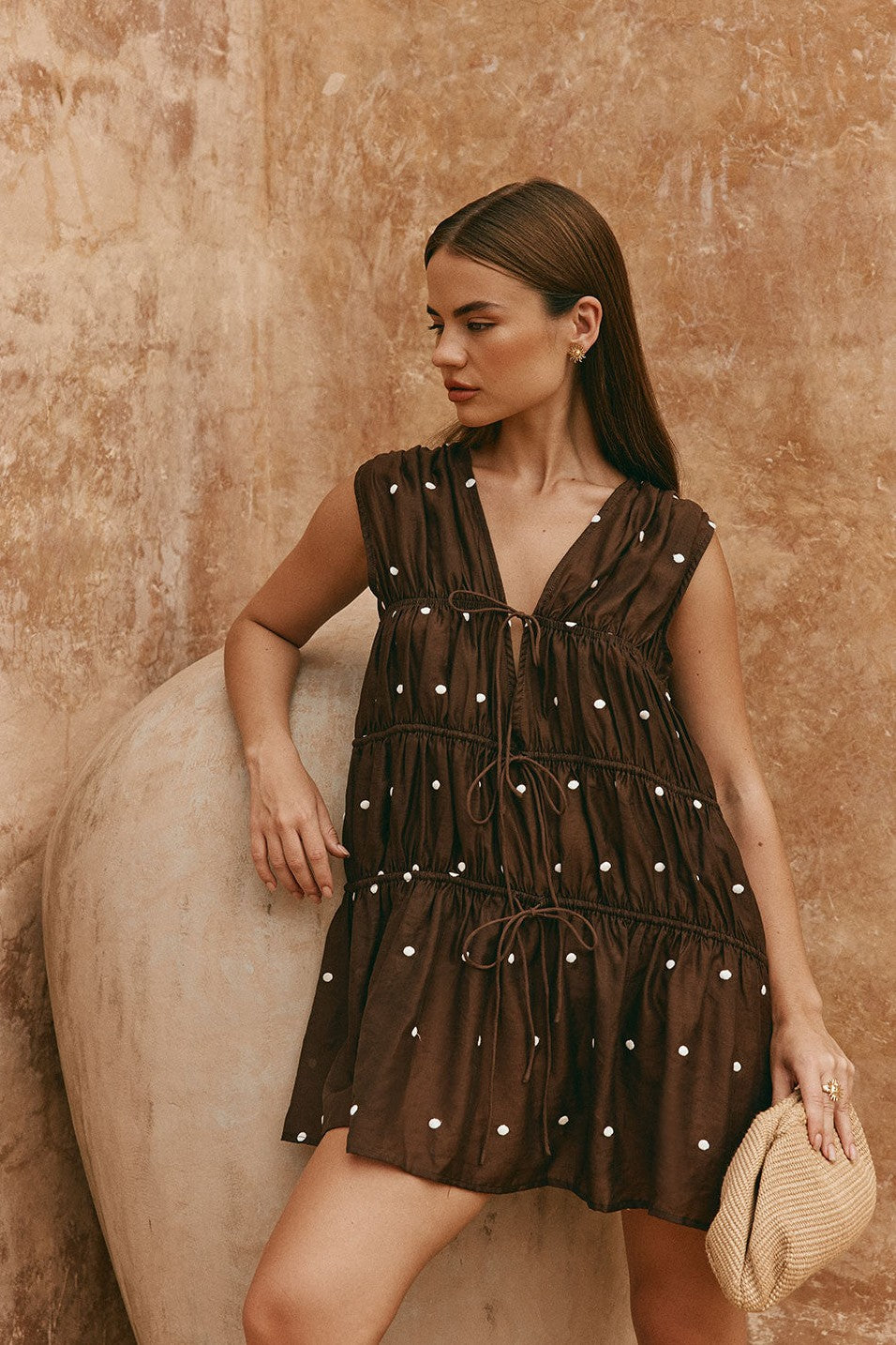 Brown mini dress with a V neckline, front view