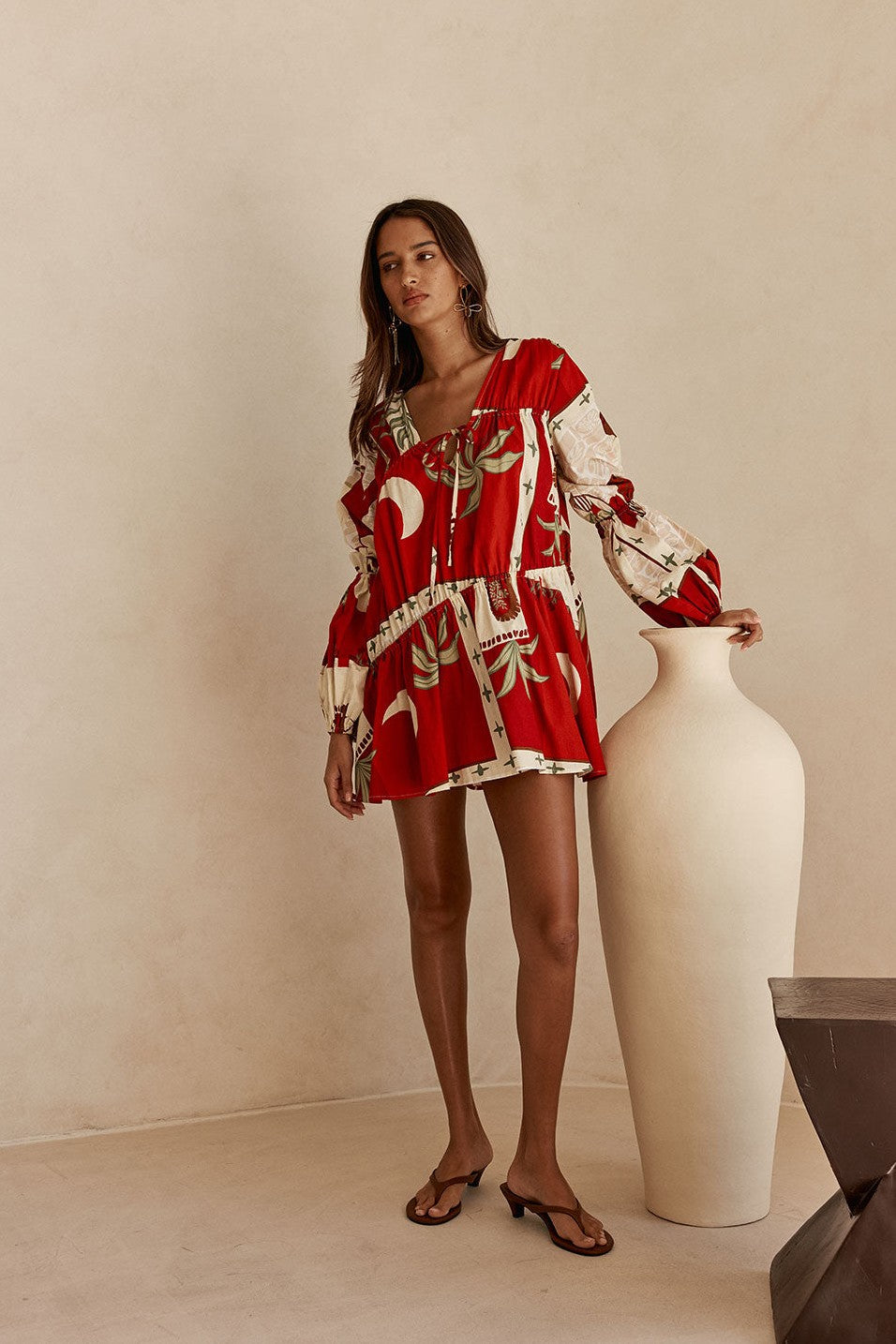 Red mini dress with a V neckline, front view