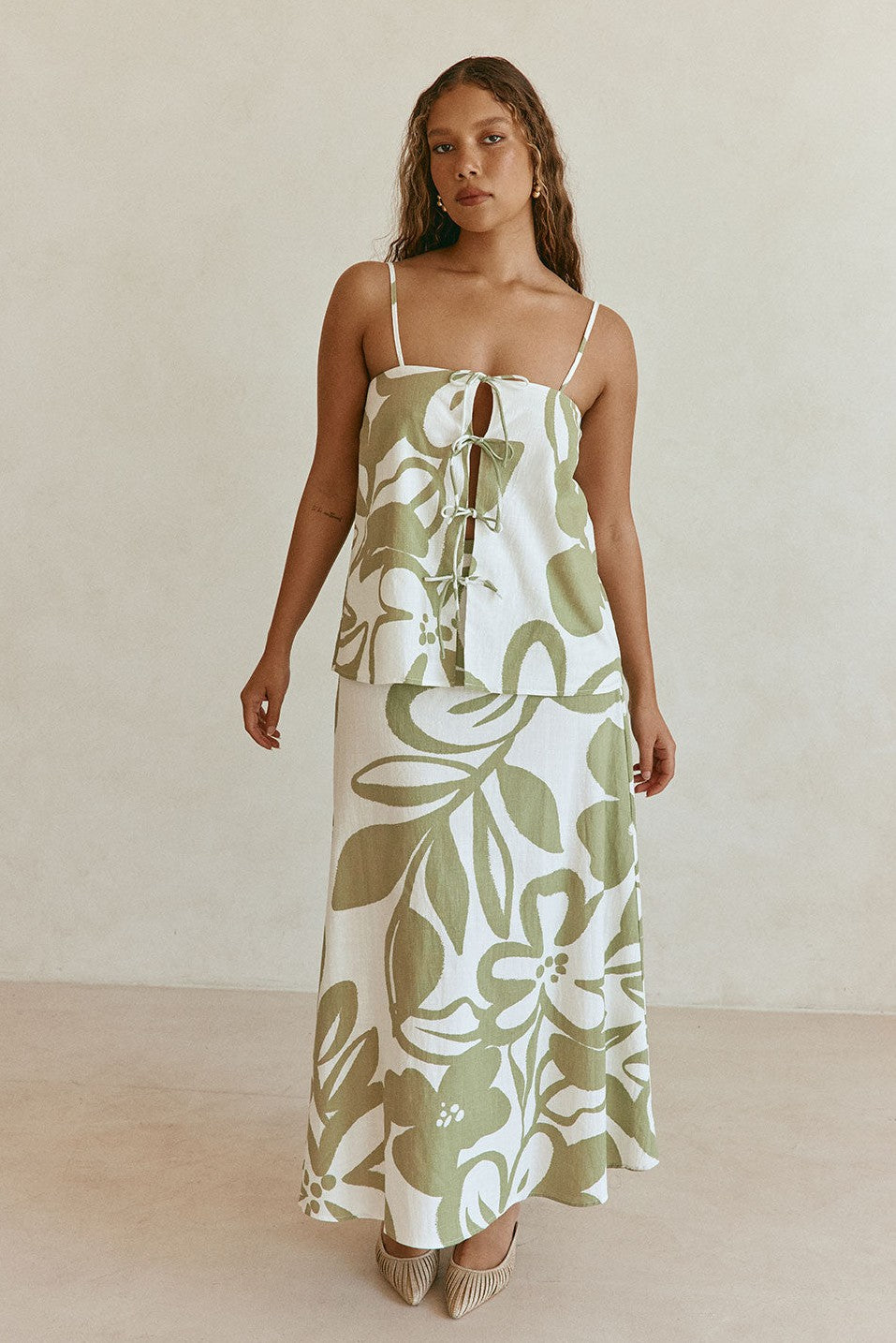 Green maxi dress with an A-line skirt, front view