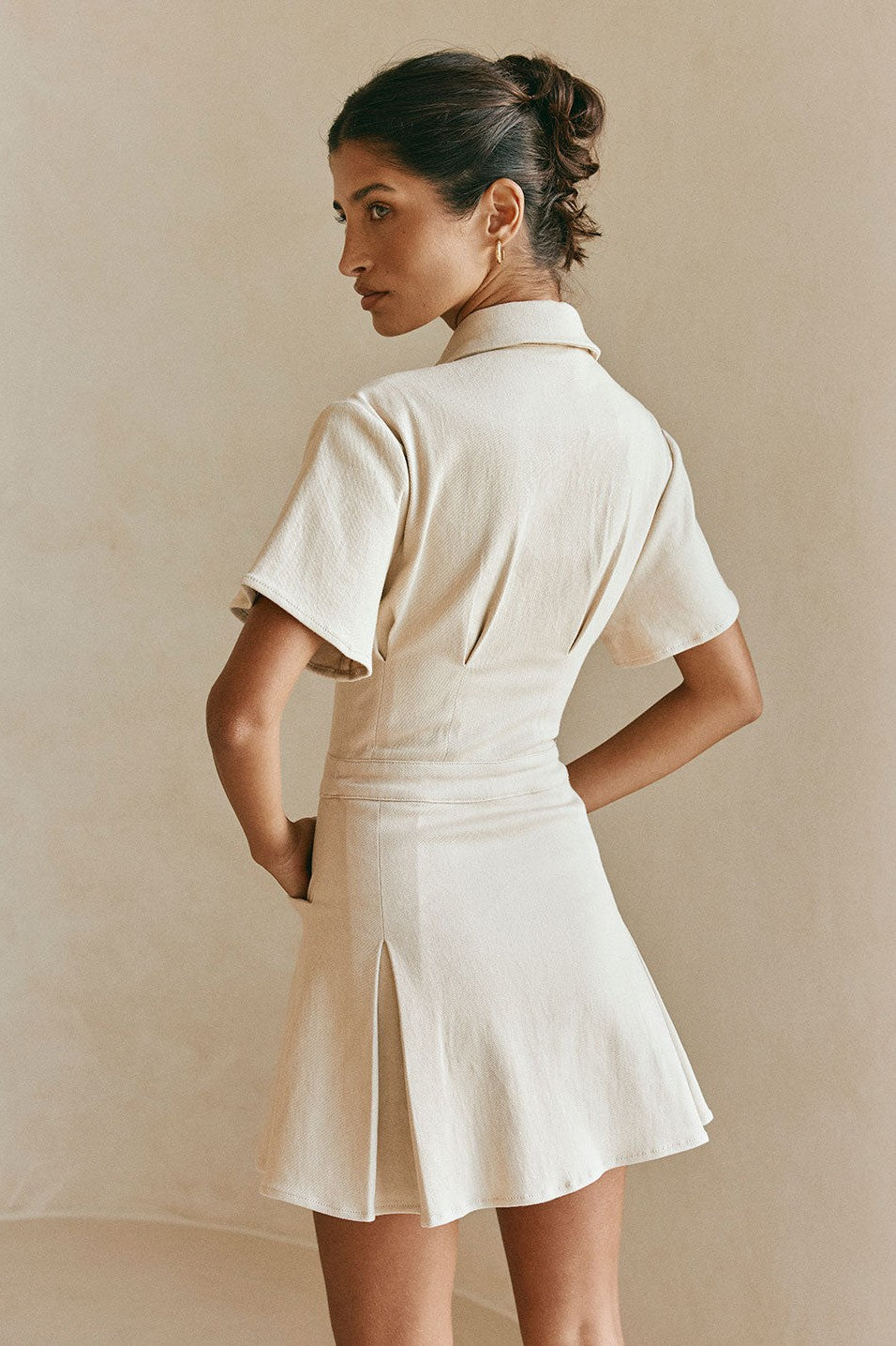 Tan mini dress, back view