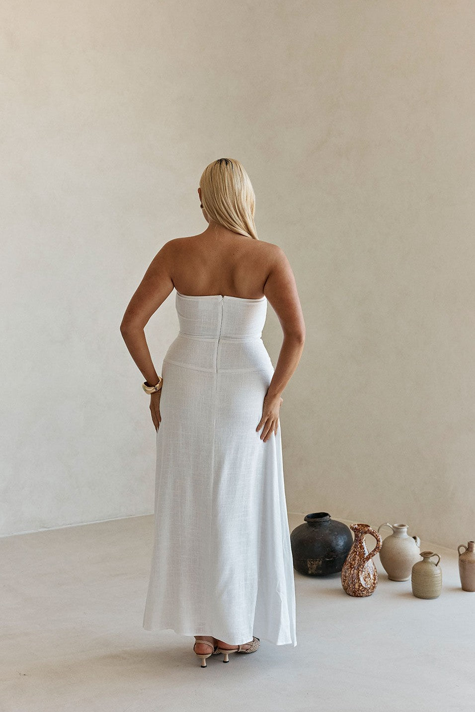 White maxi dress with a strapless neckline, front view