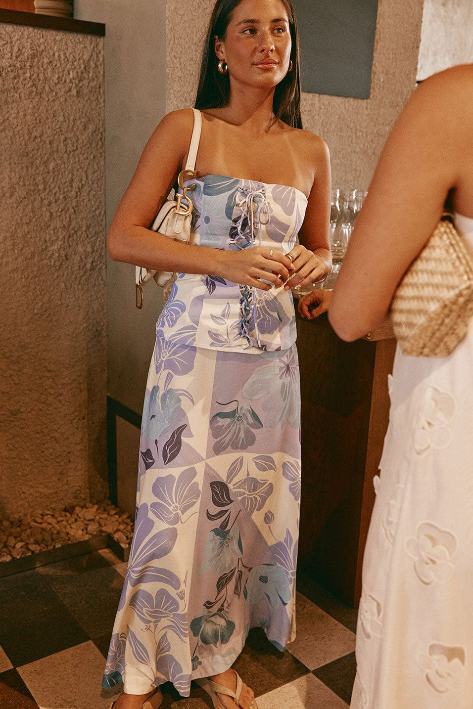 Blue maxi dress with a strapless neckline, detail view
