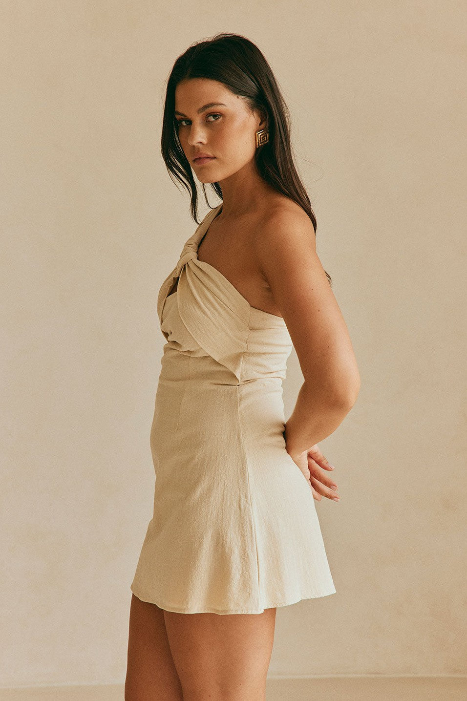 Beige mini dress, back view