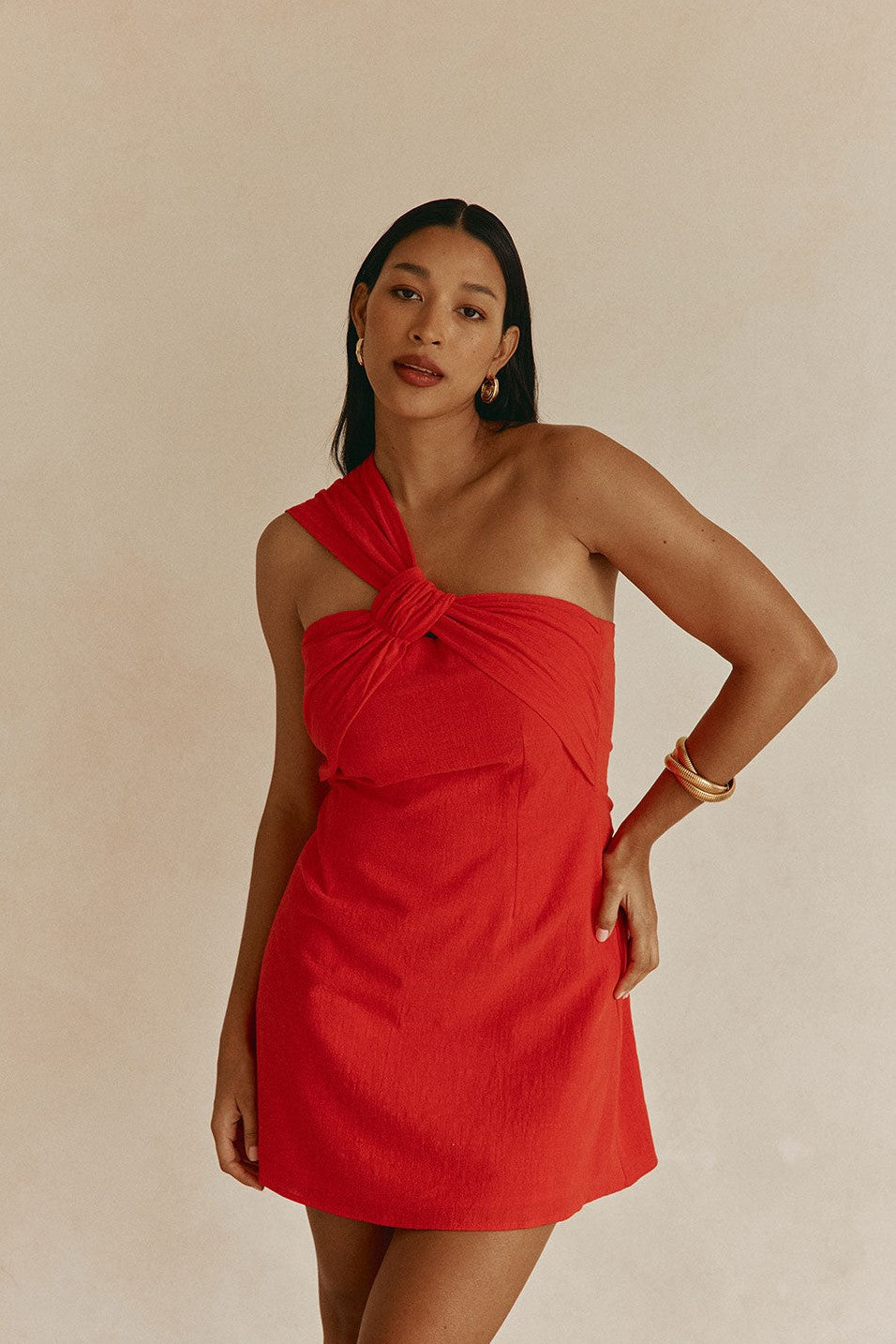 Red mini dress, styled on model
