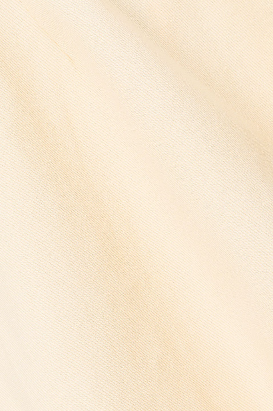 Cream mini dress with an A-line skirt, detail view
