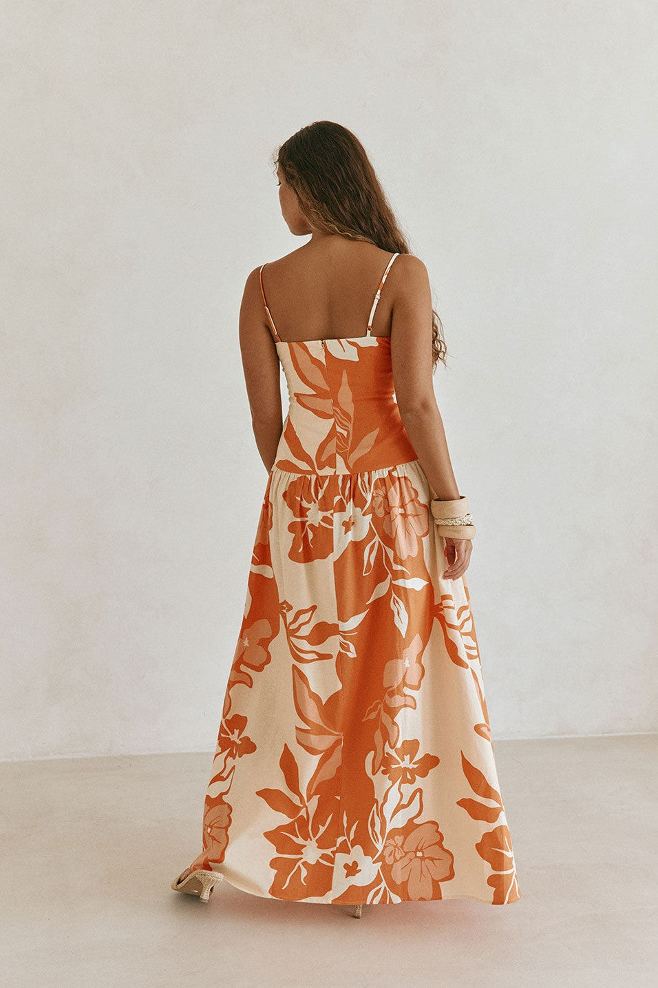 Orange maxi dress, styled on model