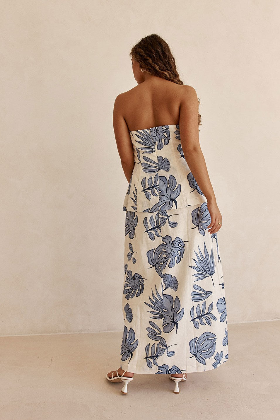 Blue maxi dress with a strapless neckline, front view