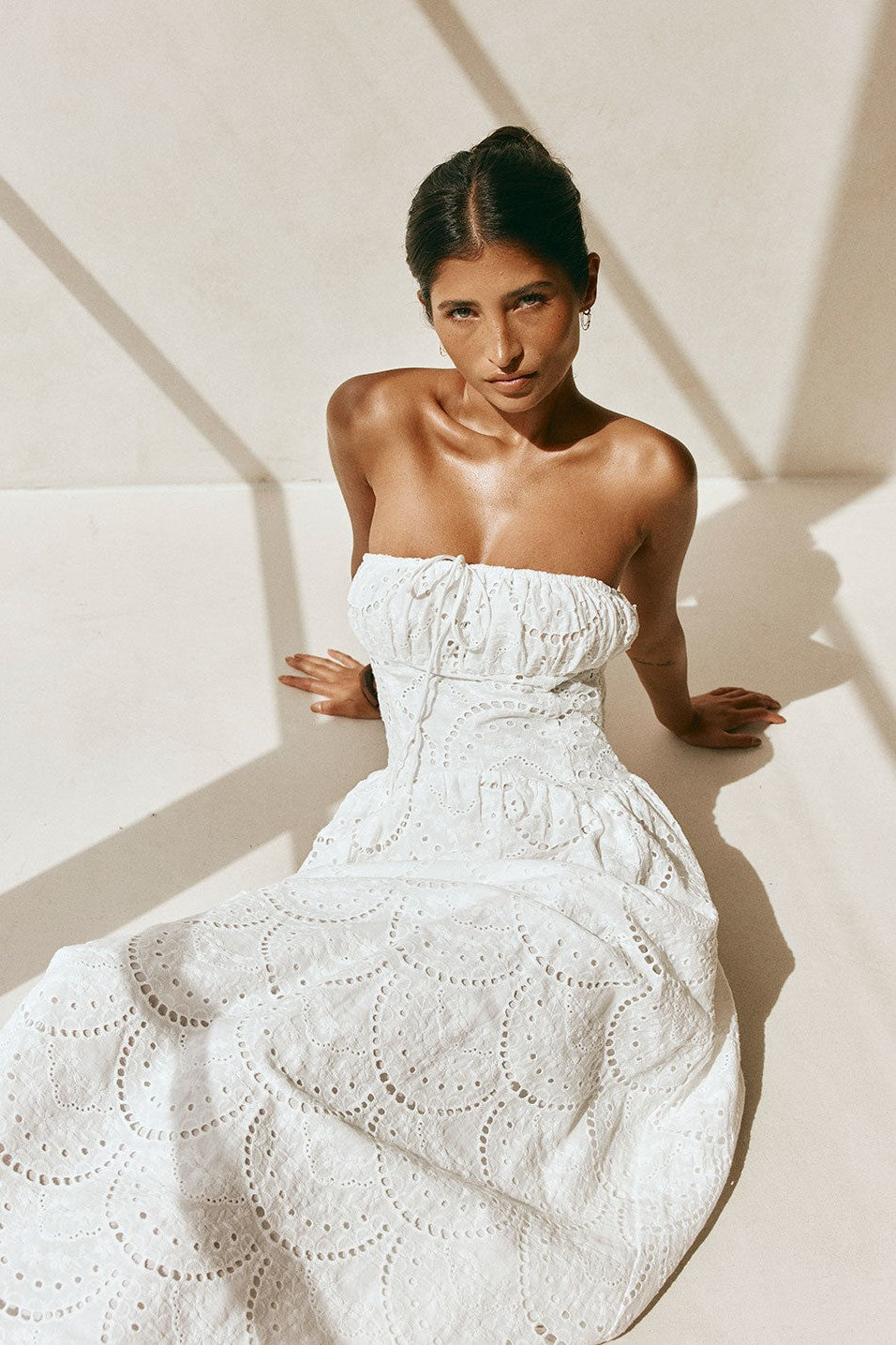 White maxi dress with a strapless neckline, front view