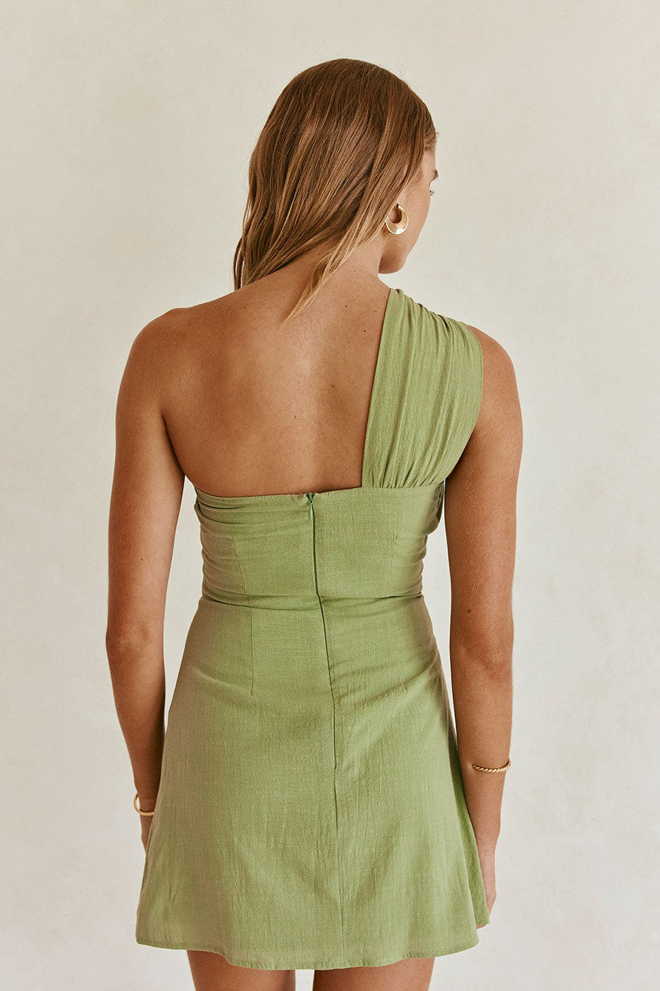 Green mini dress, detail view