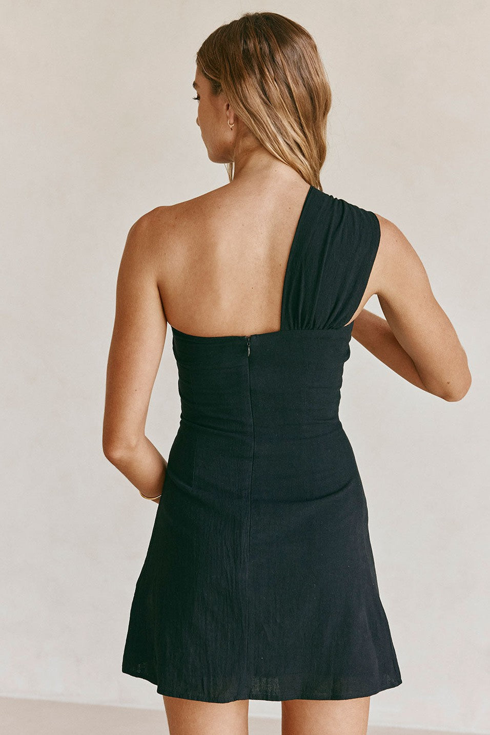 Black mini dress, styled on model