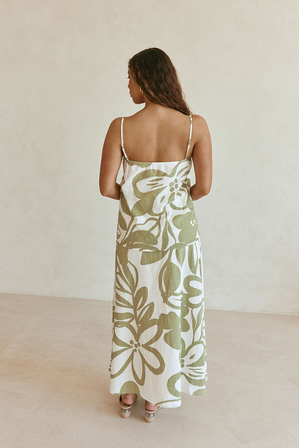 Green maxi dress with an A-line skirt, detail view