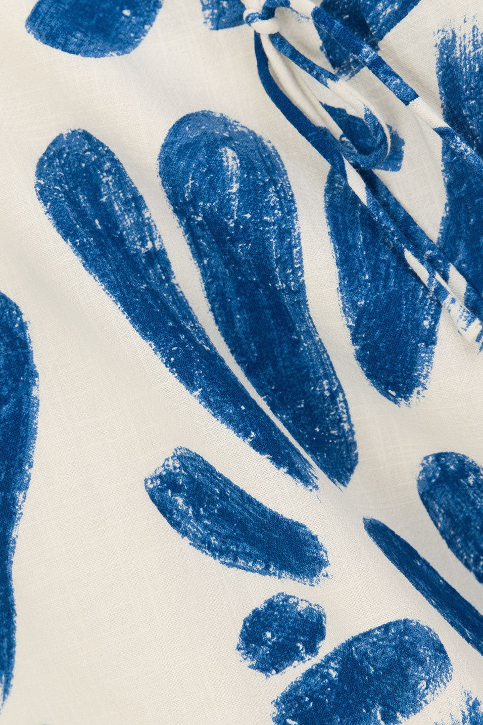 Blue mini dress with a round neckline, detail view