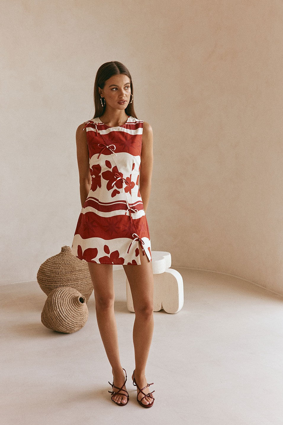 Red mini dress with a round neckline, back view