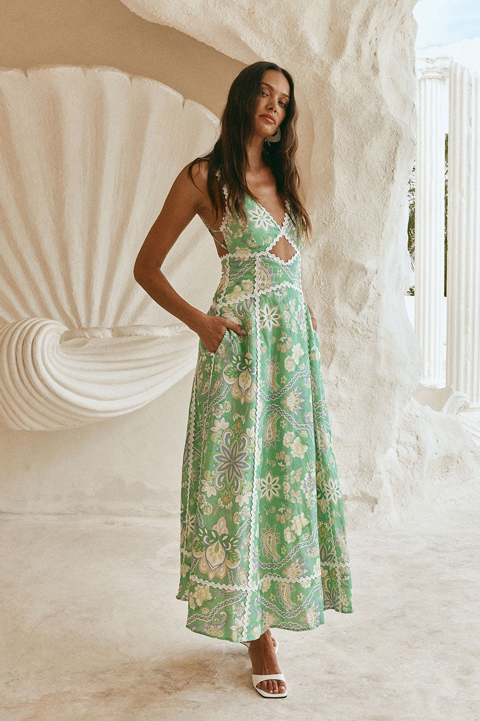Green maxi dress with an open back, back view
