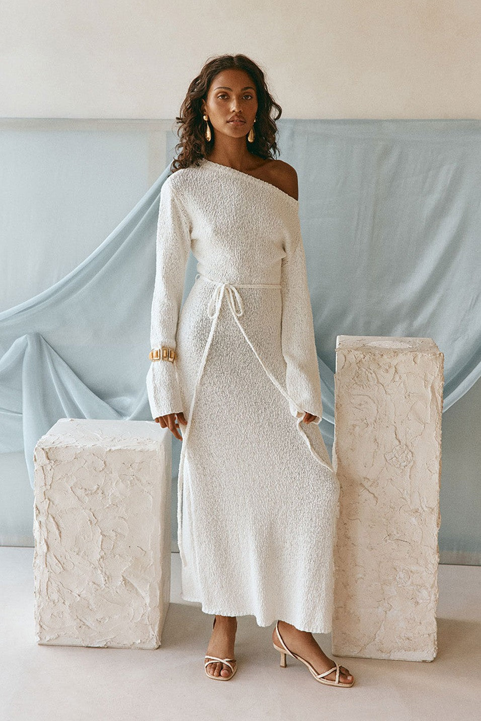White maxi dress with an A-line skirt, detail view