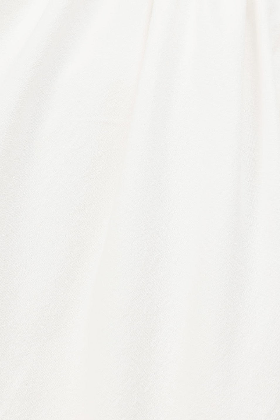 White mini dress with a boat neckline, front view