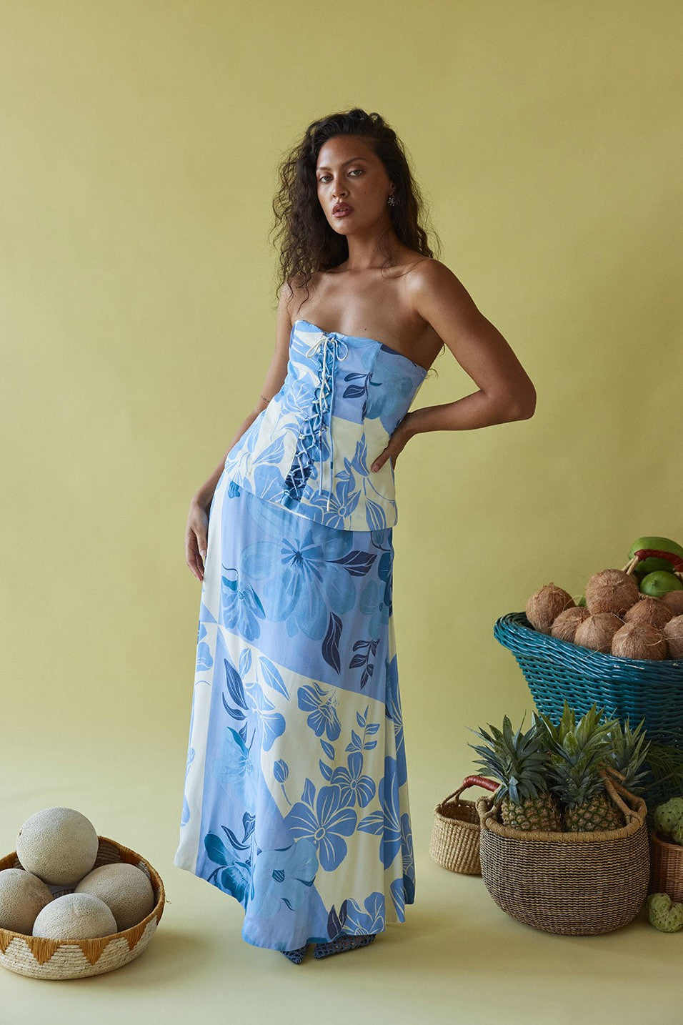 Blue maxi dress with a strapless neckline, back view