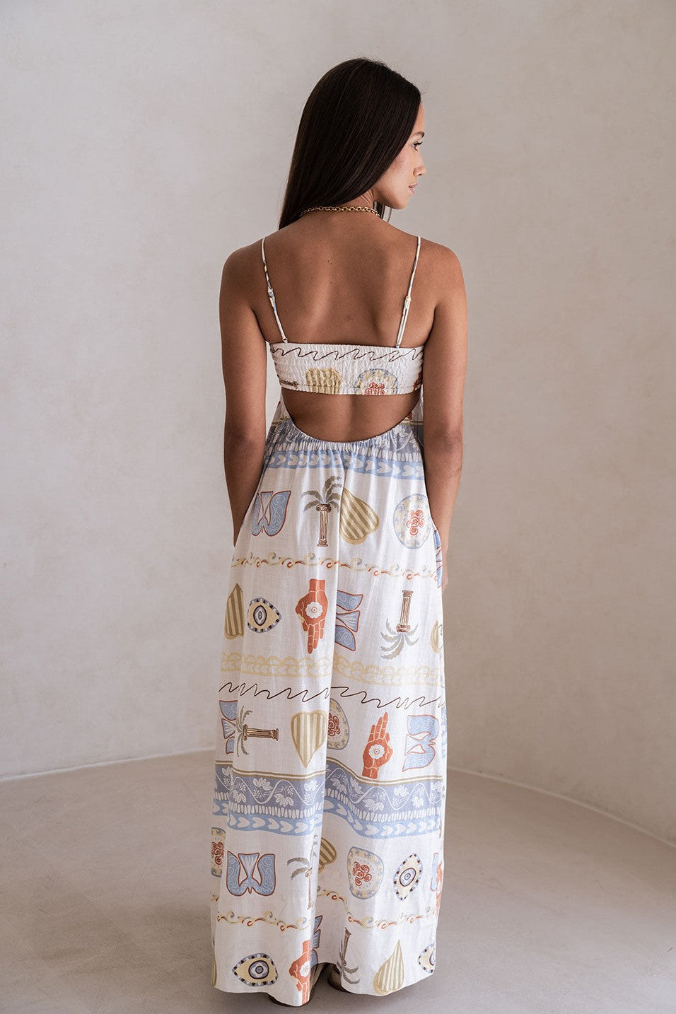 Blue maxi dress with a round neckline, back view