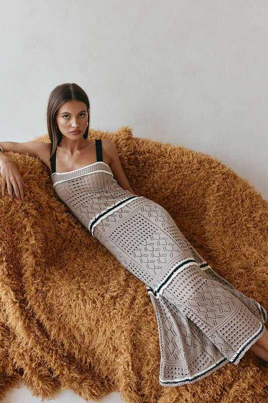 Brown maxi dress with an A-line skirt, front view