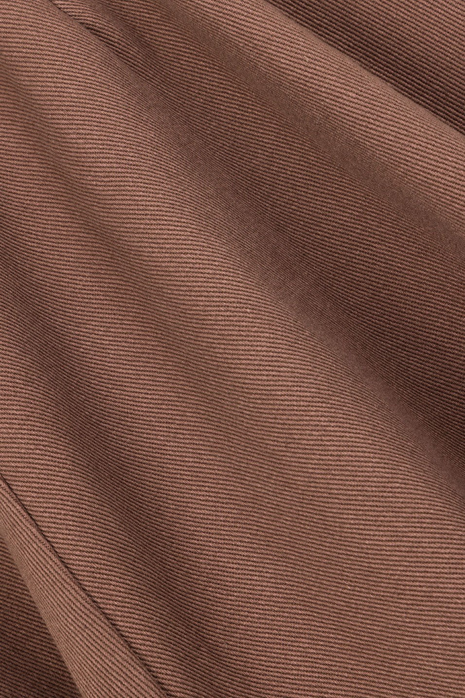 Brown mini dress with an A-line skirt, side view