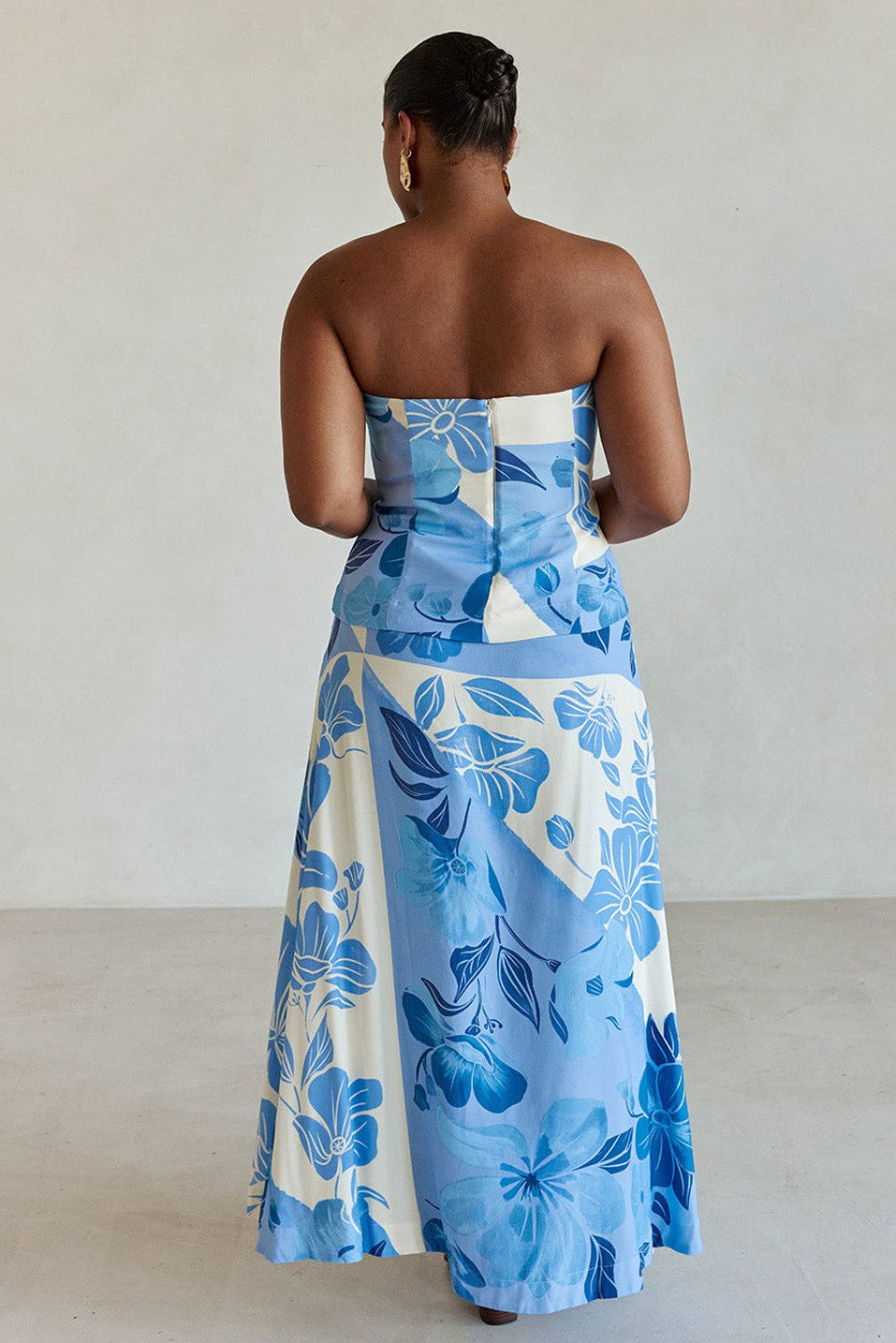 Blue maxi dress with a strapless neckline, front view