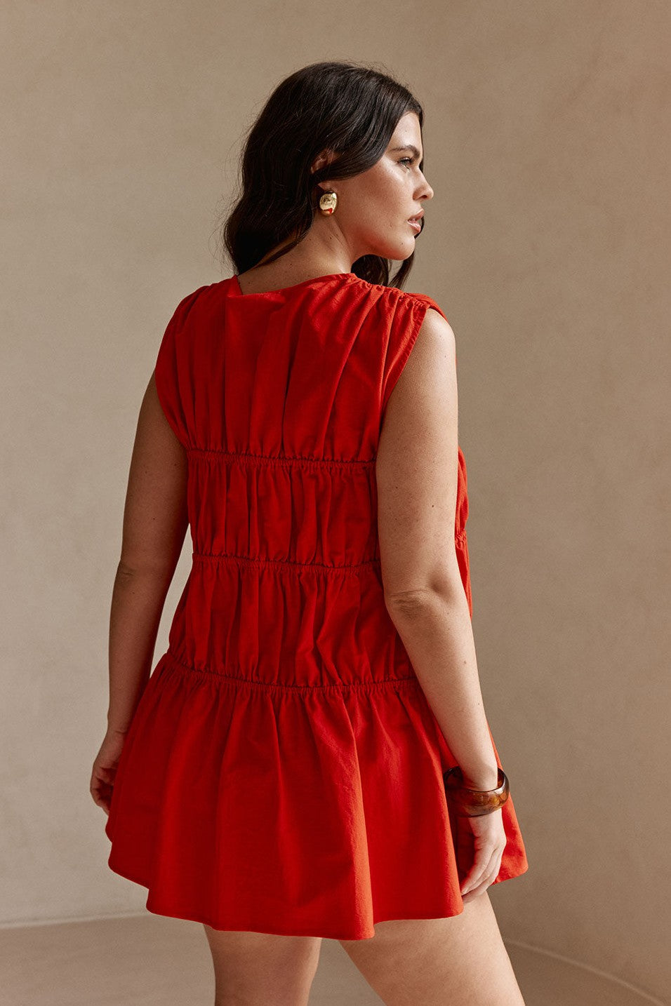 Red mini dress with a V neckline, front view
