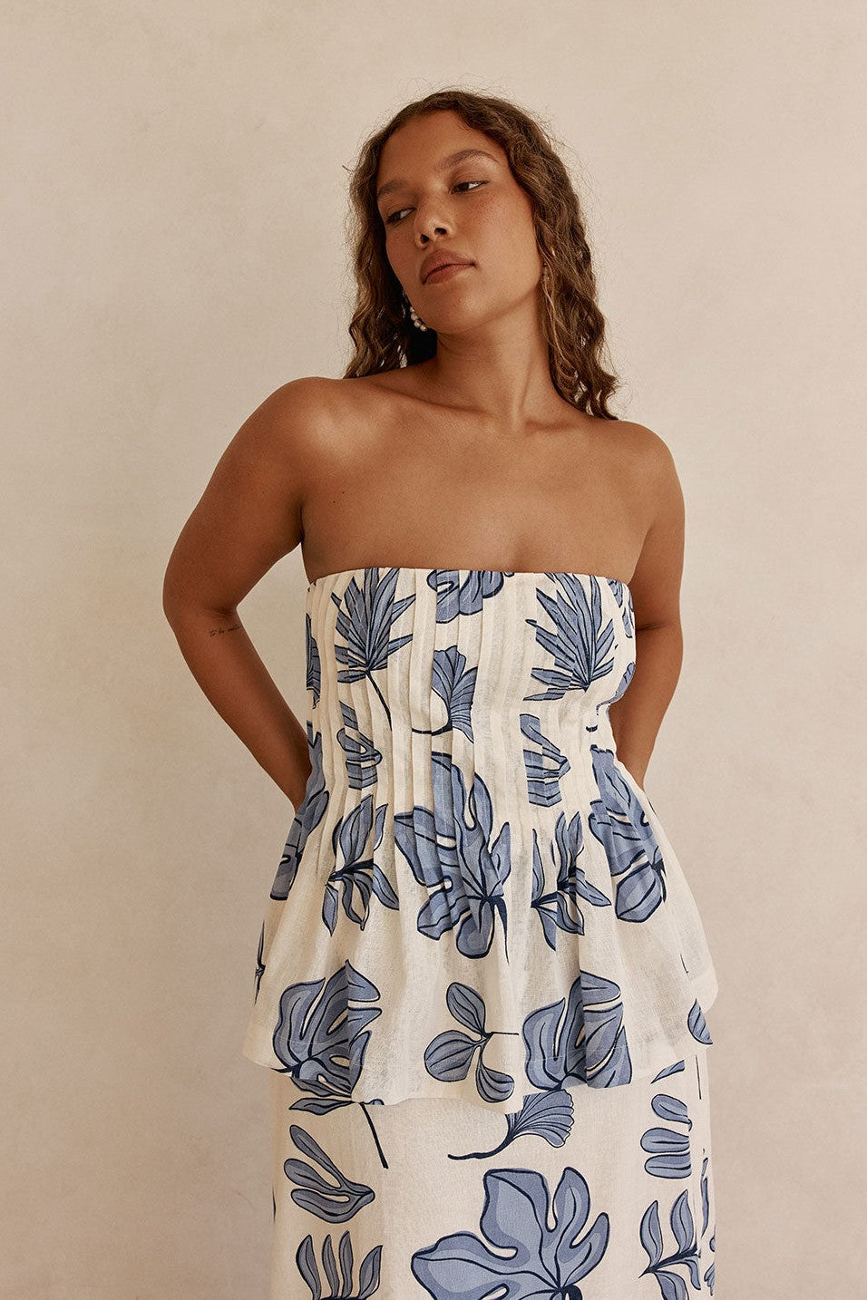 Blue maxi dress with a strapless neckline, detail view
