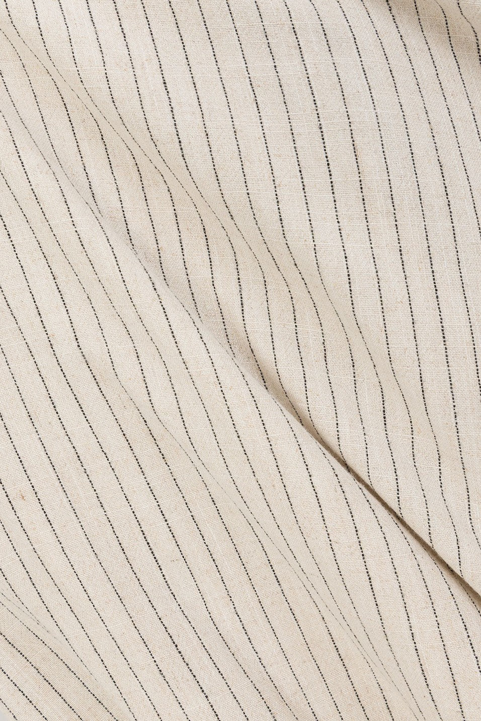 Beige maxi dress with a wrap silhouette, side view