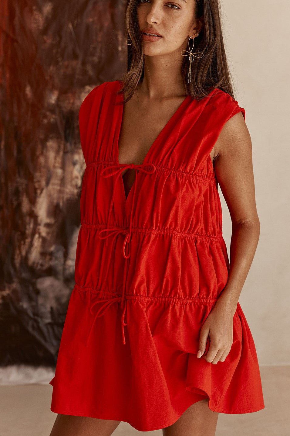 Red mini dress with a V neckline, front view