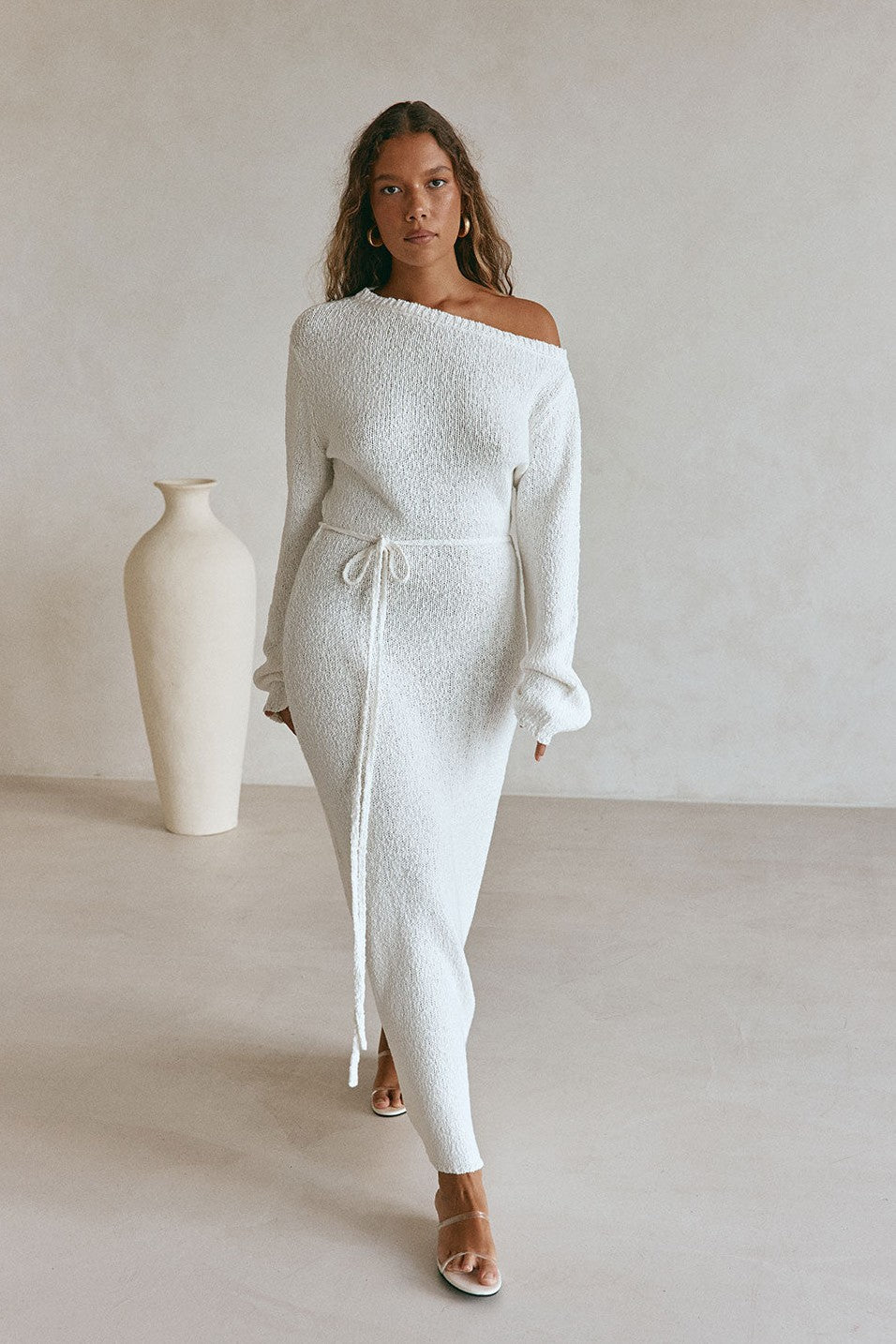 White maxi dress with an A-line skirt, back view
