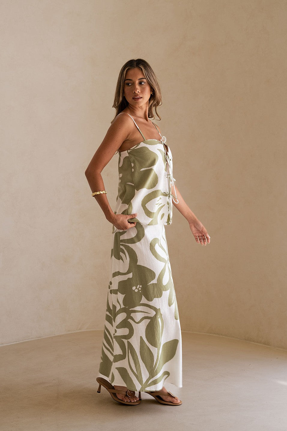 Green maxi dress with an A-line skirt, front view