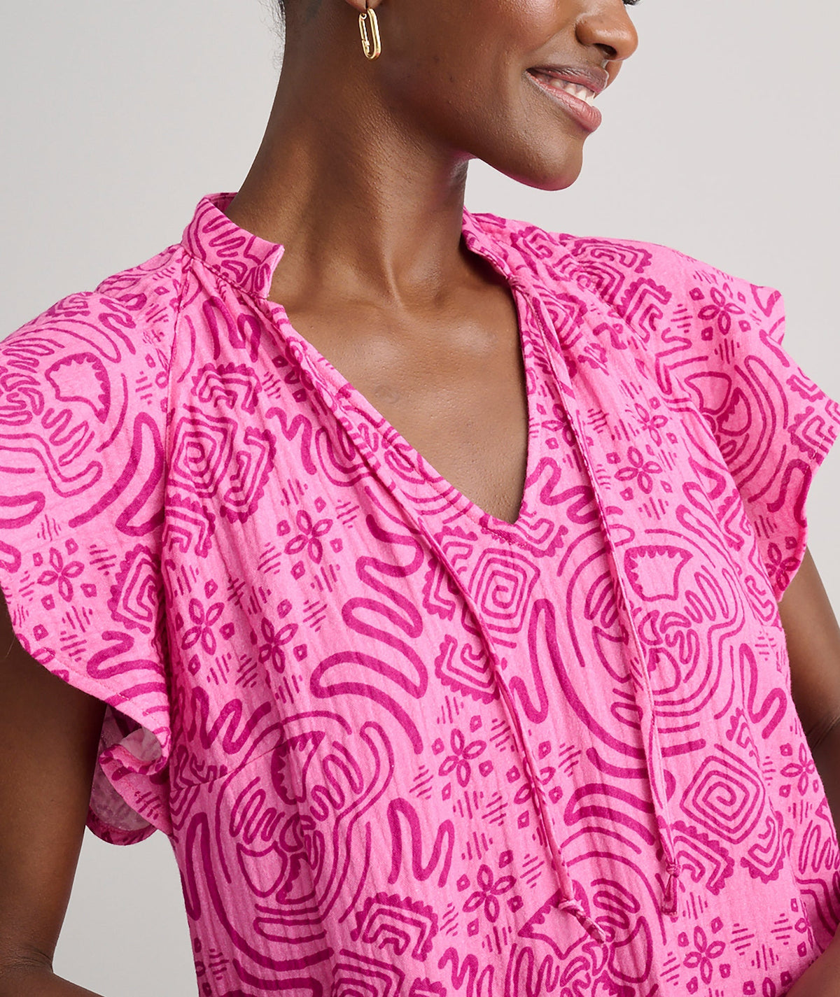 pink geometric print dress, side view