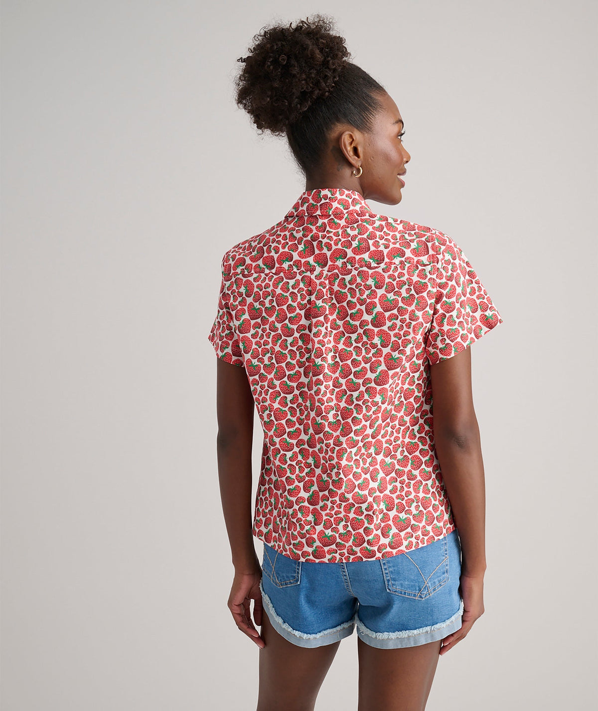 pink strawberry print shirt, back view